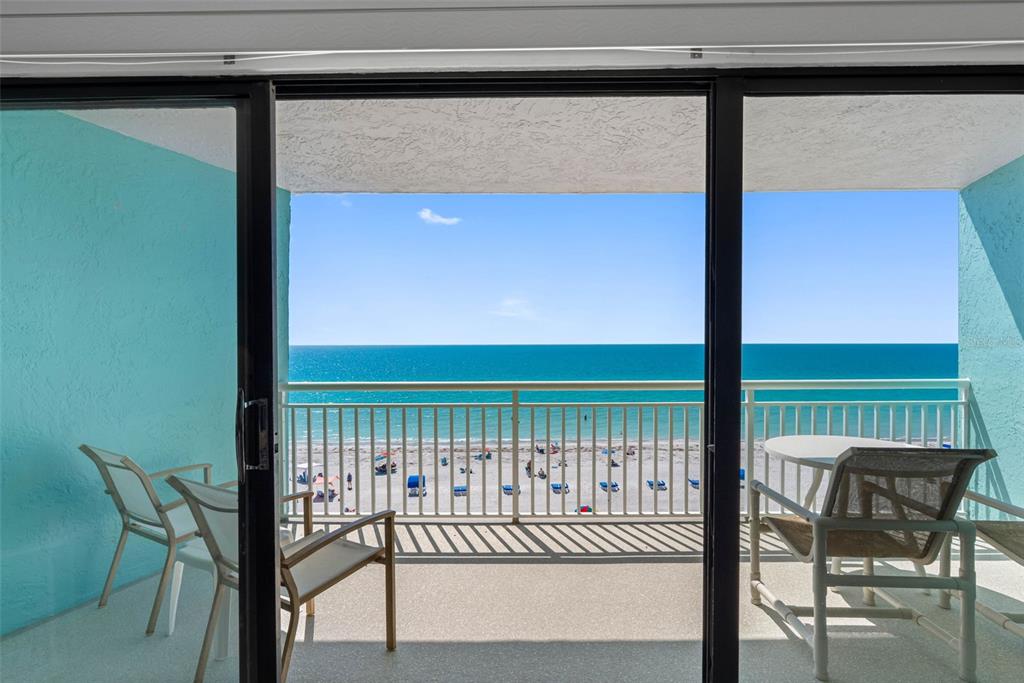 19440 Gulf Boulevard, Unit 506 Indian Rocks Beach, FL 33785 - Photo 49 of 67 a view of a porch with furniture