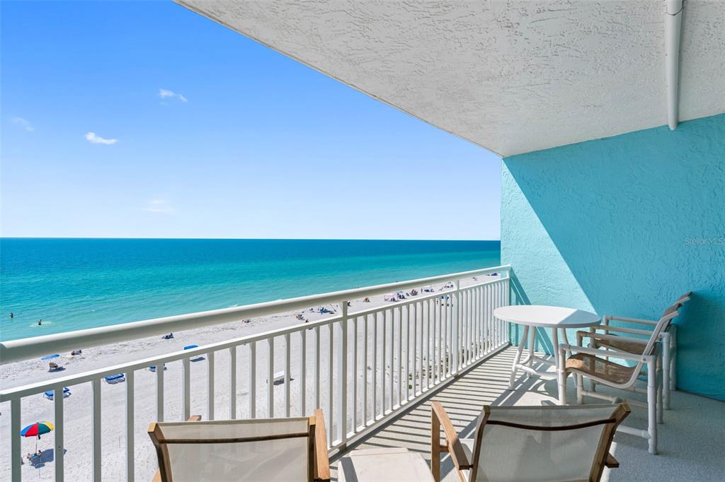 19440 Gulf Boulevard, Unit 506 Indian Rocks Beach, FL 33785 - Photo 6 of 67 a view of a chairs and table in the balcony