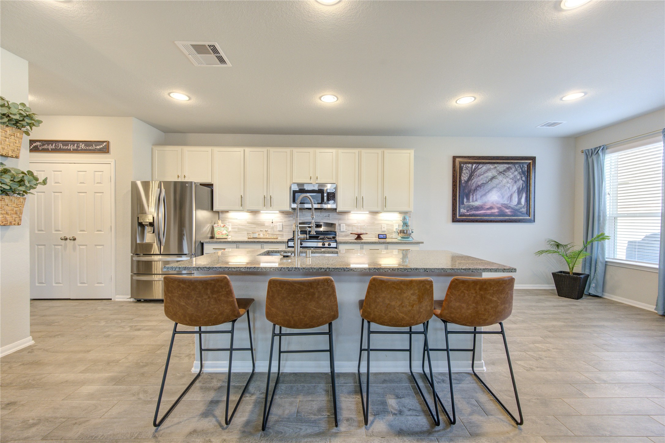 5439 Rustic Ruby Drive Brookshire, TX 77423 - Photo 11 of 43 While whipping up your signature dish, the center island is sure to be packed with multiple taste-testers!