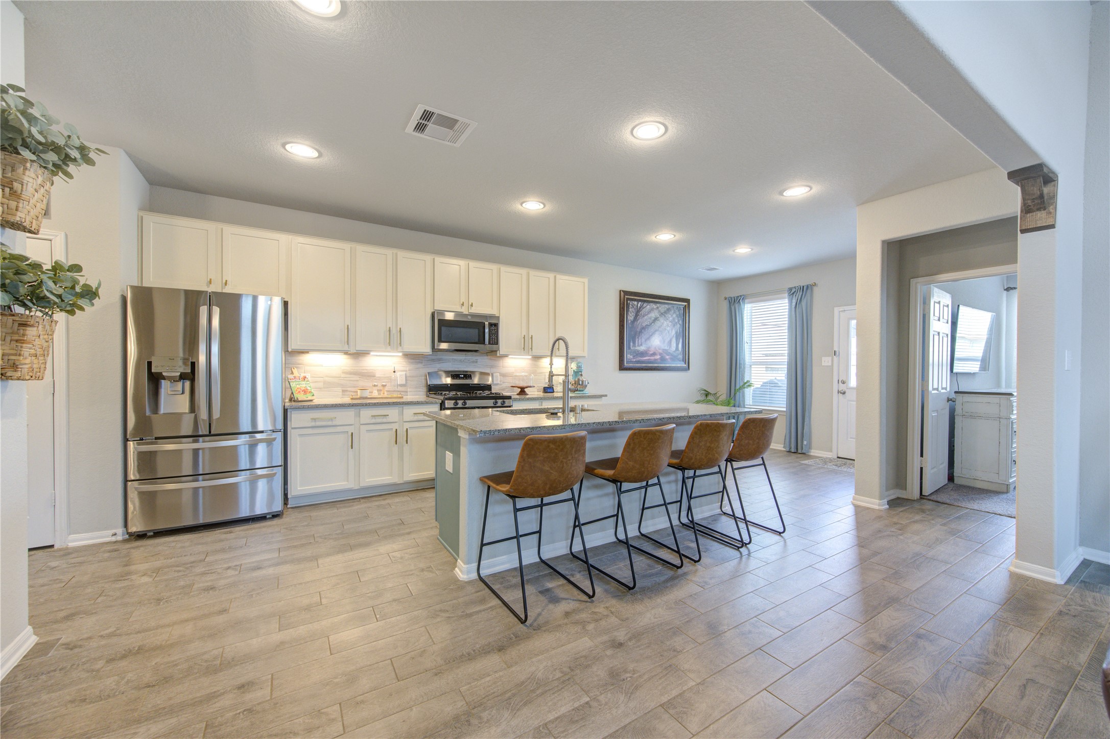 5439 Rustic Ruby Drive Brookshire, TX 77423 - Photo 12 of 43 Do not be intimidated by the size of the kitchen, it is absolutely practical with tons of sophistication and luxury engraved at every corner!