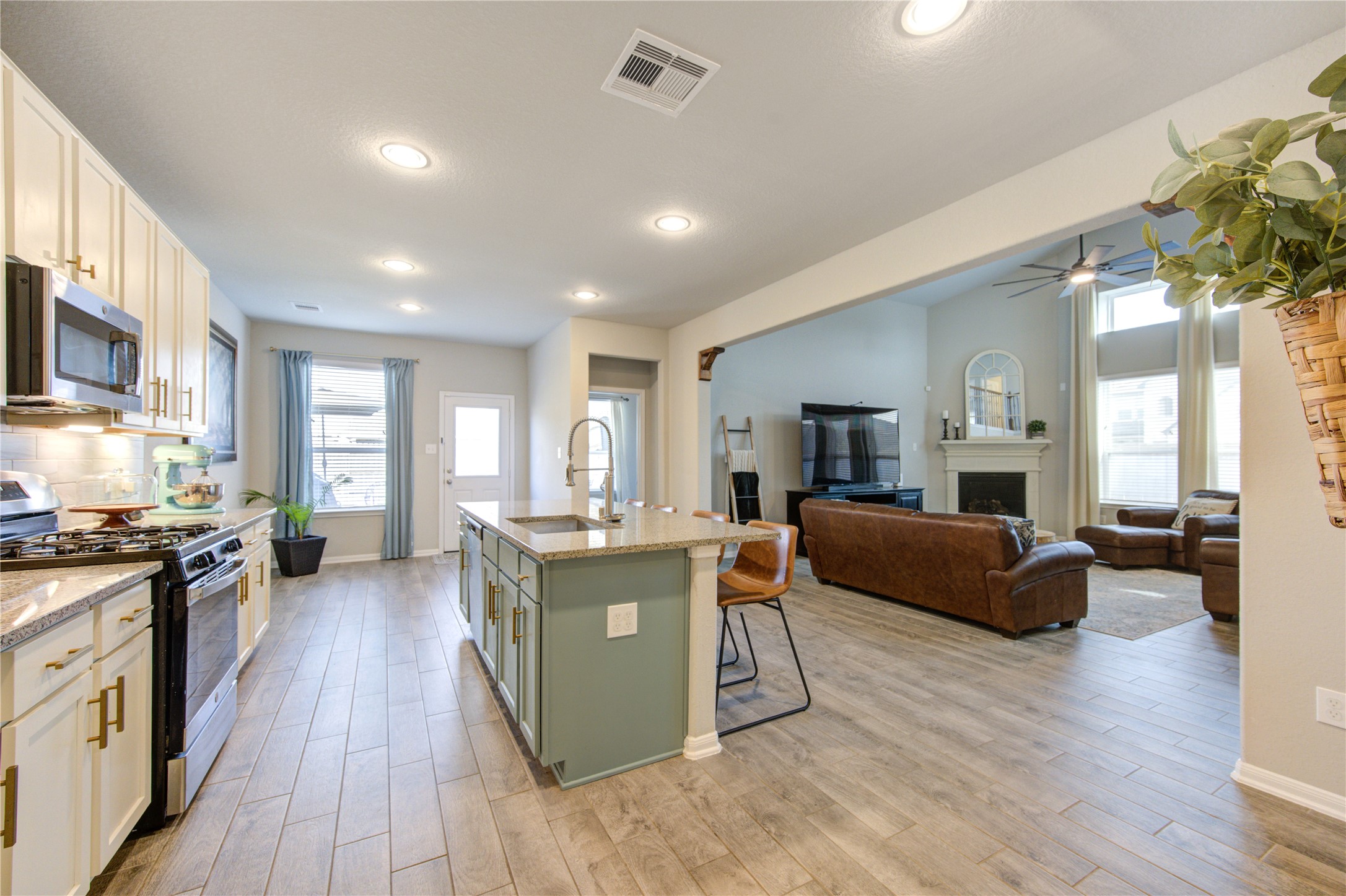 5439 Rustic Ruby Drive Brookshire, TX 77423 - Photo 13 of 43 The home flows so well, this open concept family room, kitchen and breakfast area, can handle easily huge gatherings of family, friends, or guests with room to spare.
