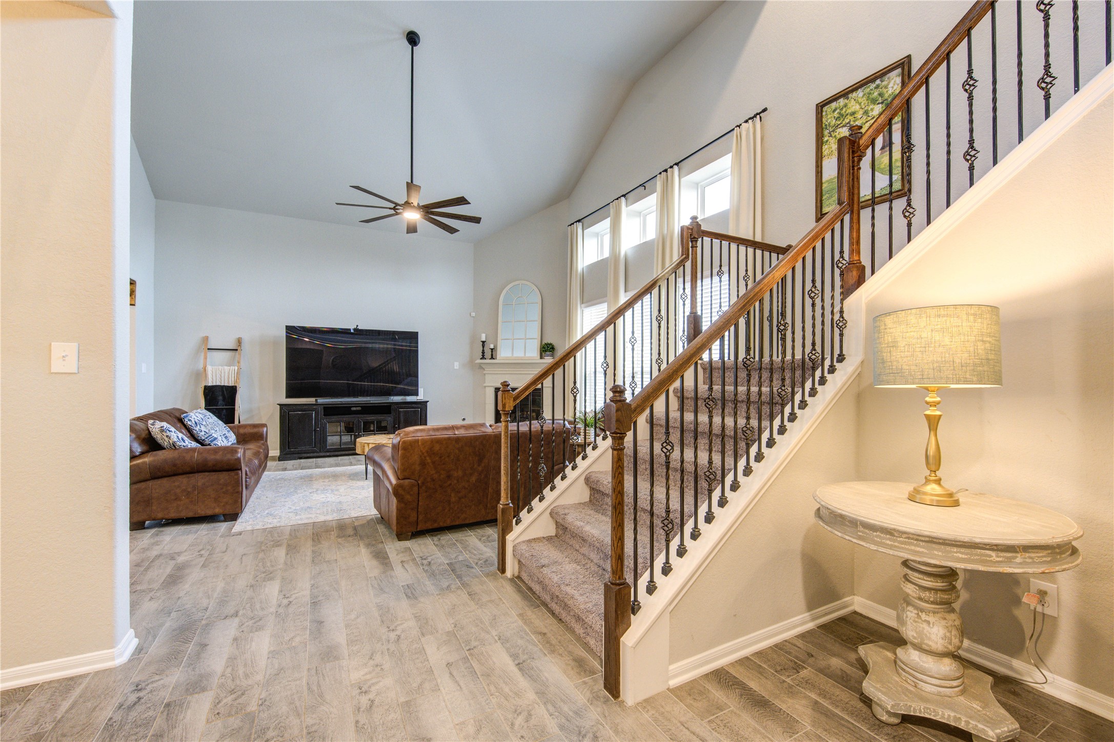 5439 Rustic Ruby Drive Brookshire, TX 77423 - Photo 20 of 43 Wooden staircase features wrought iron spindles - casual elegance at its finest!