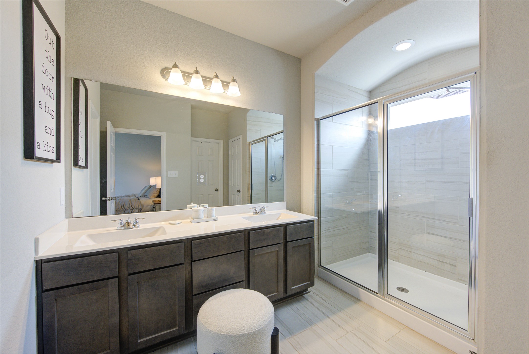 5439 Rustic Ruby Drive Brookshire, TX 77423 - Photo 23 of 43 You don't have to share! The double sink vanity and oversized mirror lends itself to harmonious mornings.