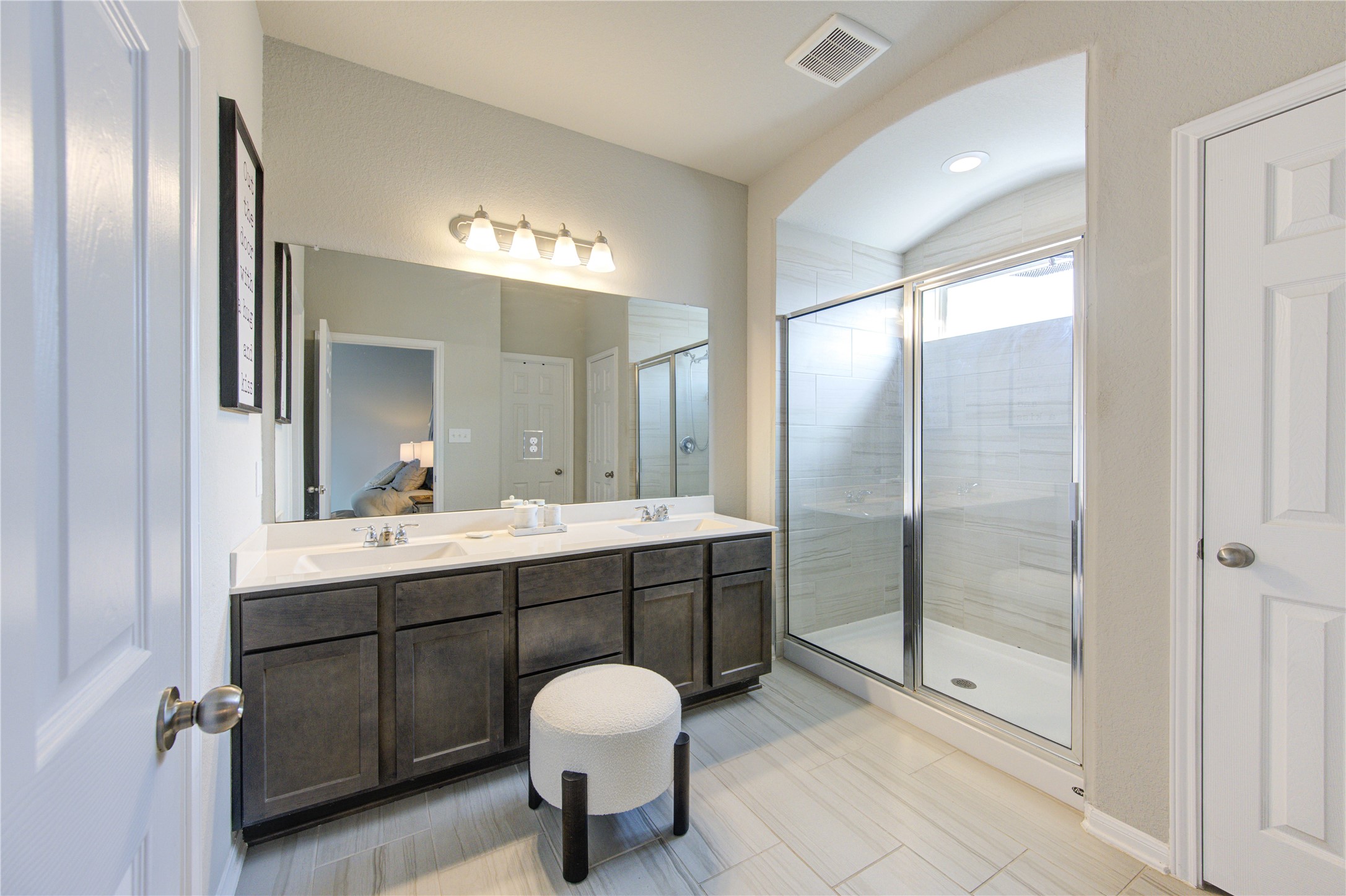 5439 Rustic Ruby Drive Brookshire, TX 77423 - Photo 24 of 43 A glass-enclosed shower mimics the luxury and attention to detail found throughout the rest of this property.