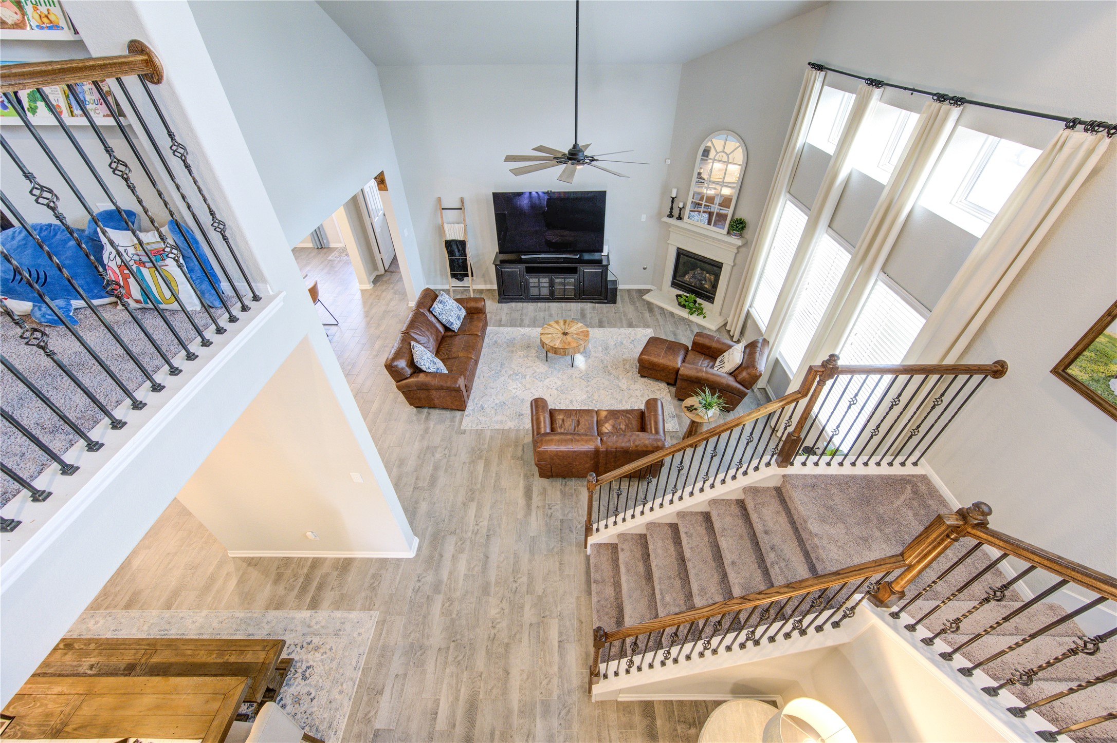 5439 Rustic Ruby Drive Brookshire, TX 77423 - Photo 31 of 43 Aerial view of family room from second floor landing.