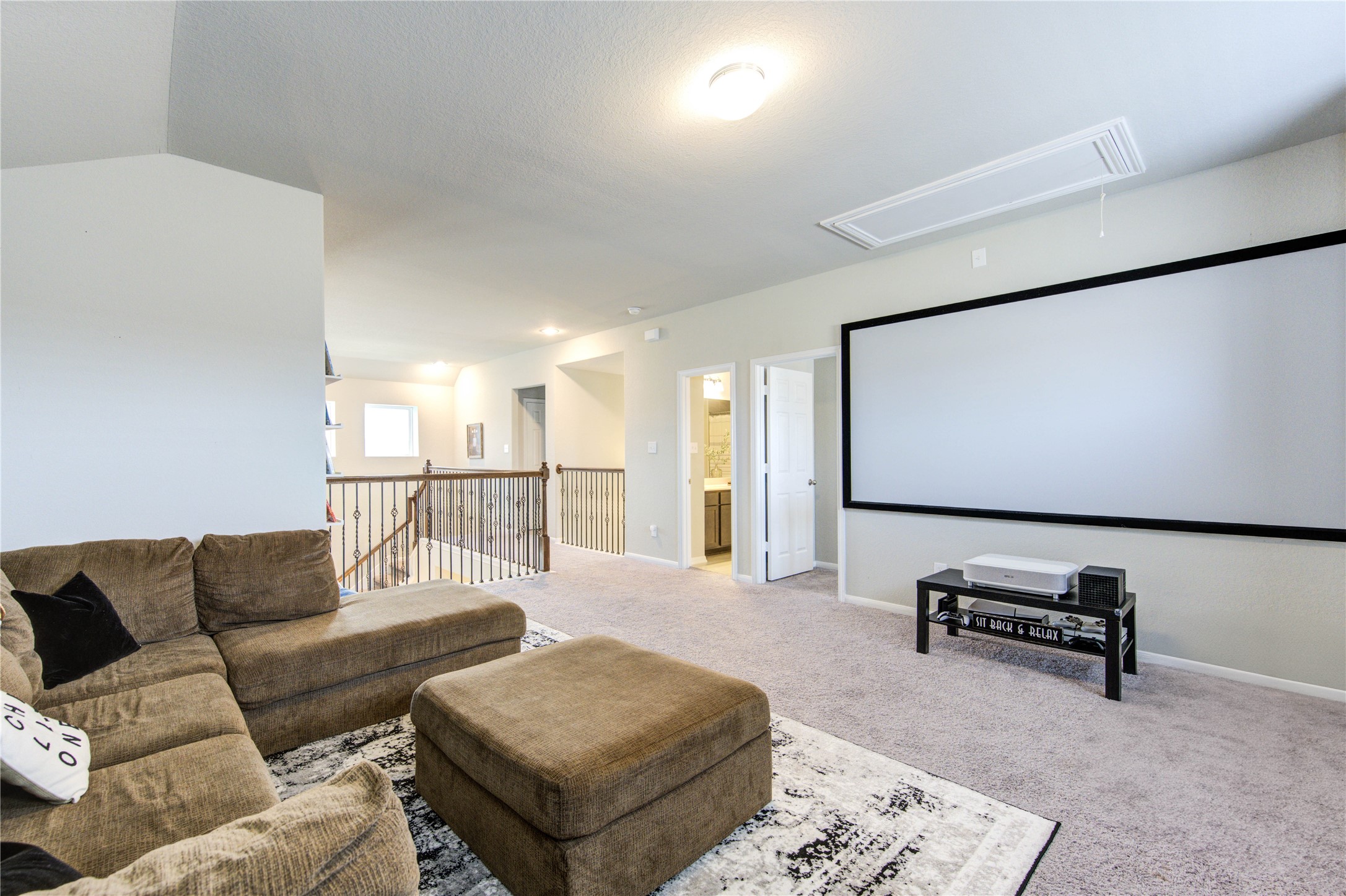 5439 Rustic Ruby Drive Brookshire, TX 77423 - Photo 32 of 43 Think of all the fun you’ll have here! This home has a spacious game room designed with relaxation in mind! There's ample space for comfy seating in preparation for snuggling up with a good book, or having friends over!