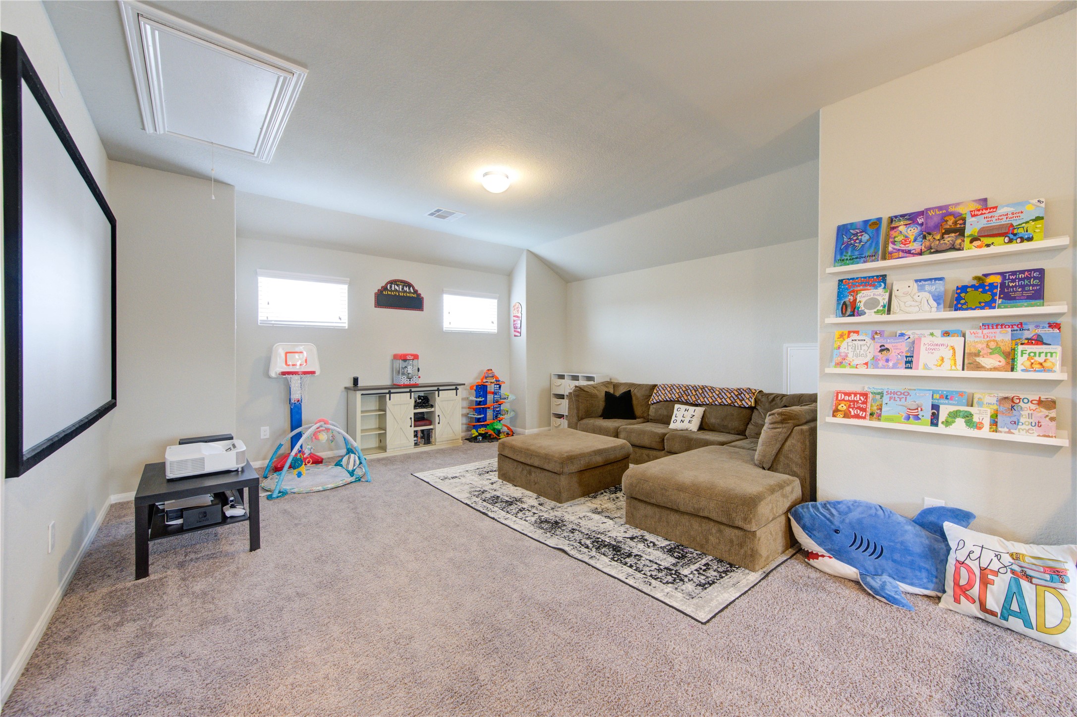 5439 Rustic Ruby Drive Brookshire, TX 77423 - Photo 34 of 43 This very spacious game and family room has plenty of space for a game table and other large furnishings. What a great spot for summer slumber parties and family game nights.