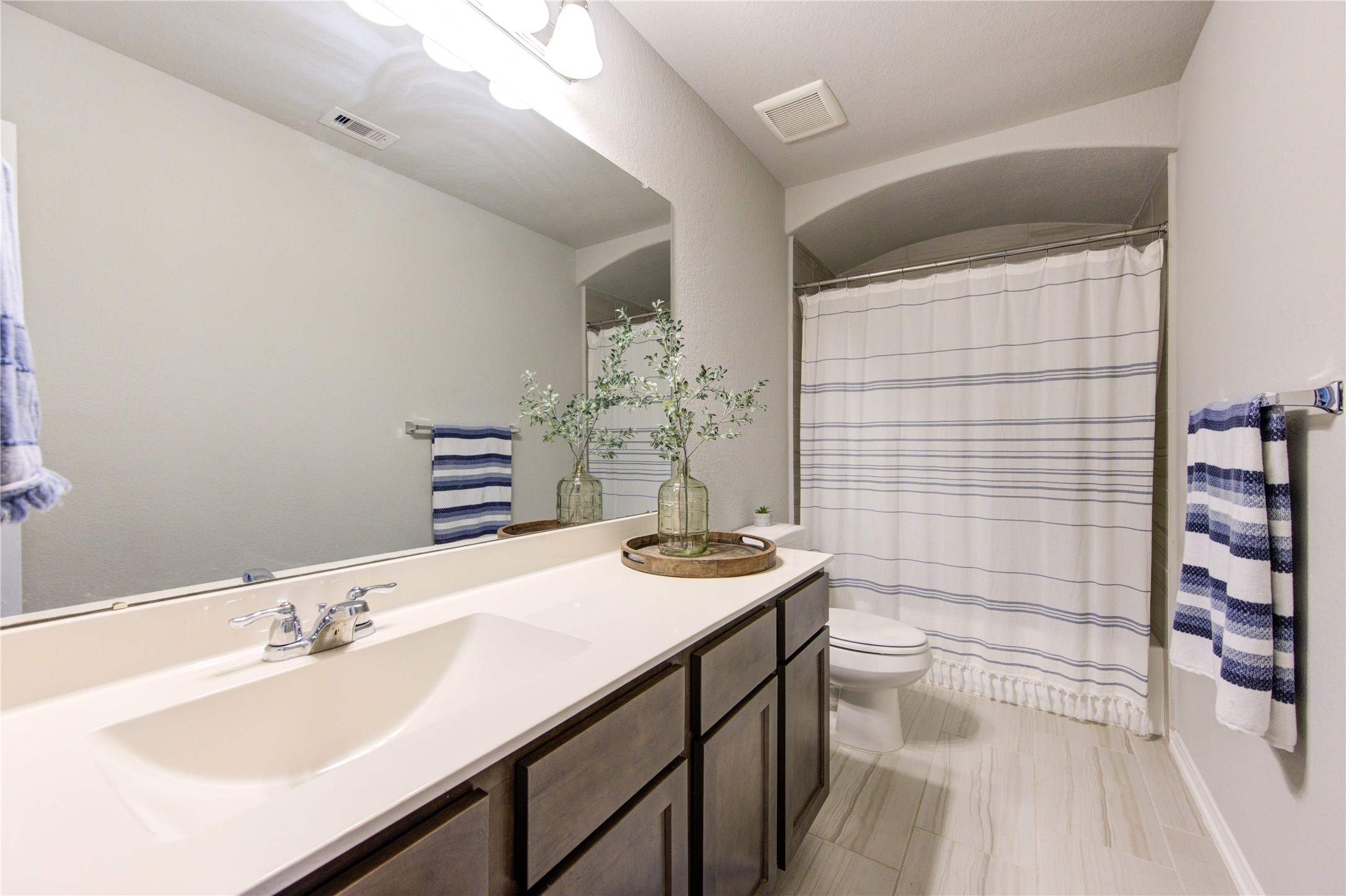 5439 Rustic Ruby Drive Brookshire, TX 77423 - Photo 36 of 43 This clean and attractive space is perfect for family and guests alike. A large vanity provides room for all the essentials.