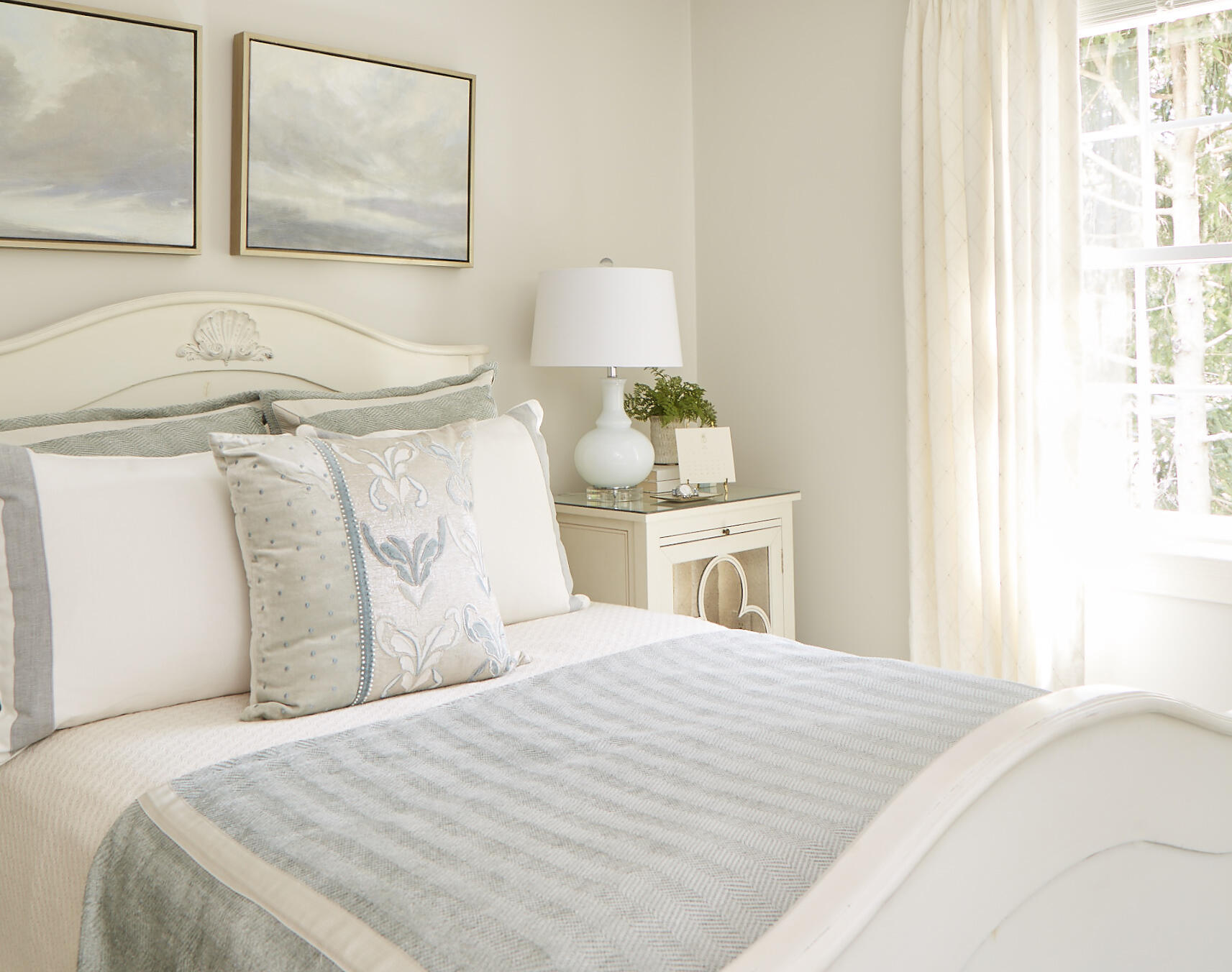 306 Monomoscoy Road Mashpee, MA 02649 - Photo 13 of 20 a bedroom with a bed and a painting on the wall