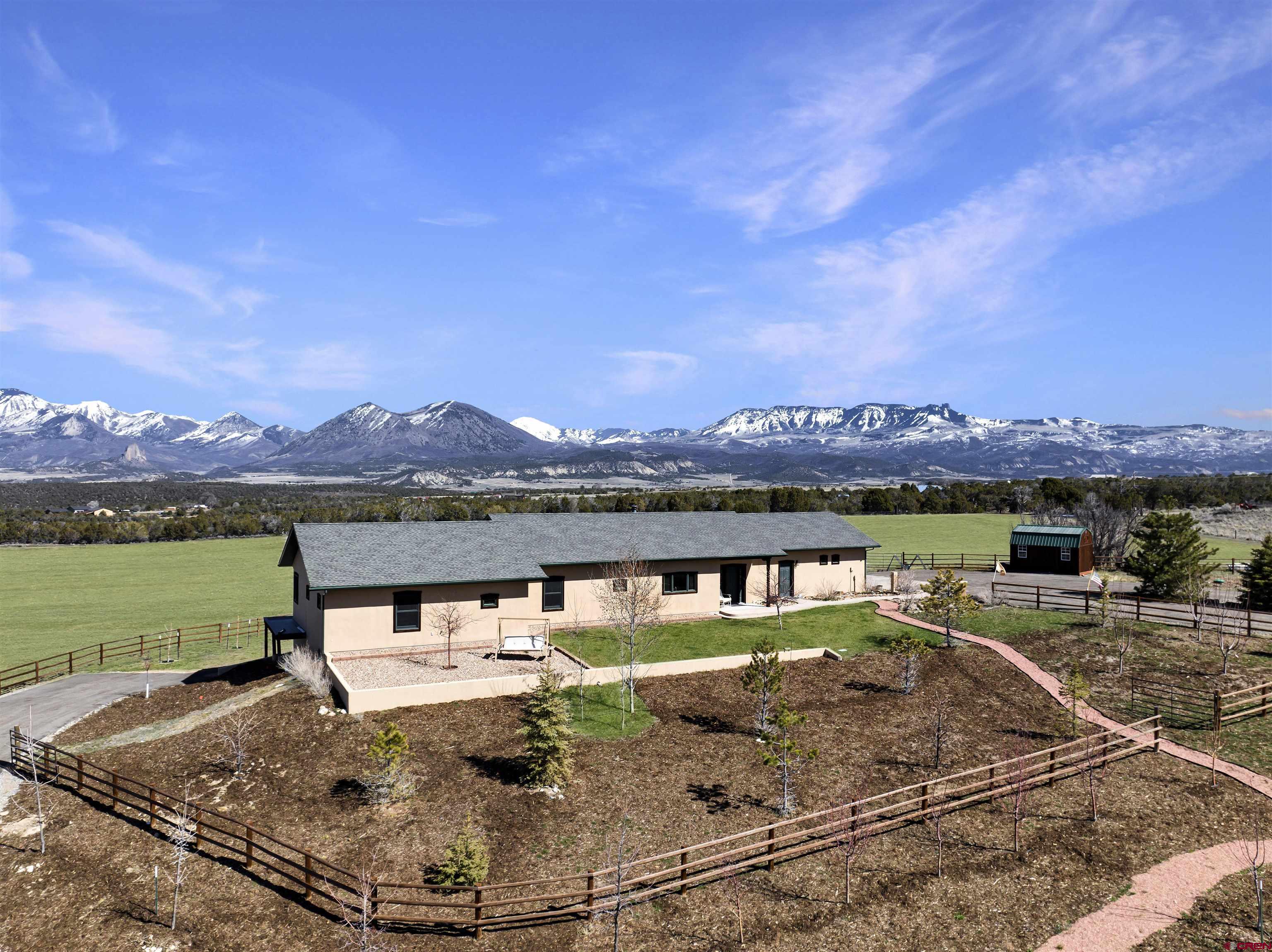 1190 7745 Road Crawford, CO 81415 - Photo 2 of 43 a view of a lake with a mountain