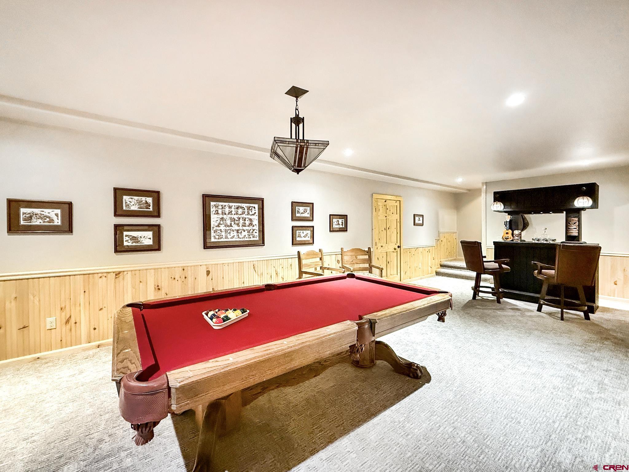 1190 7745 Road Crawford, CO 81415 - Photo 26 of 43 a bed room with a bed and a couch