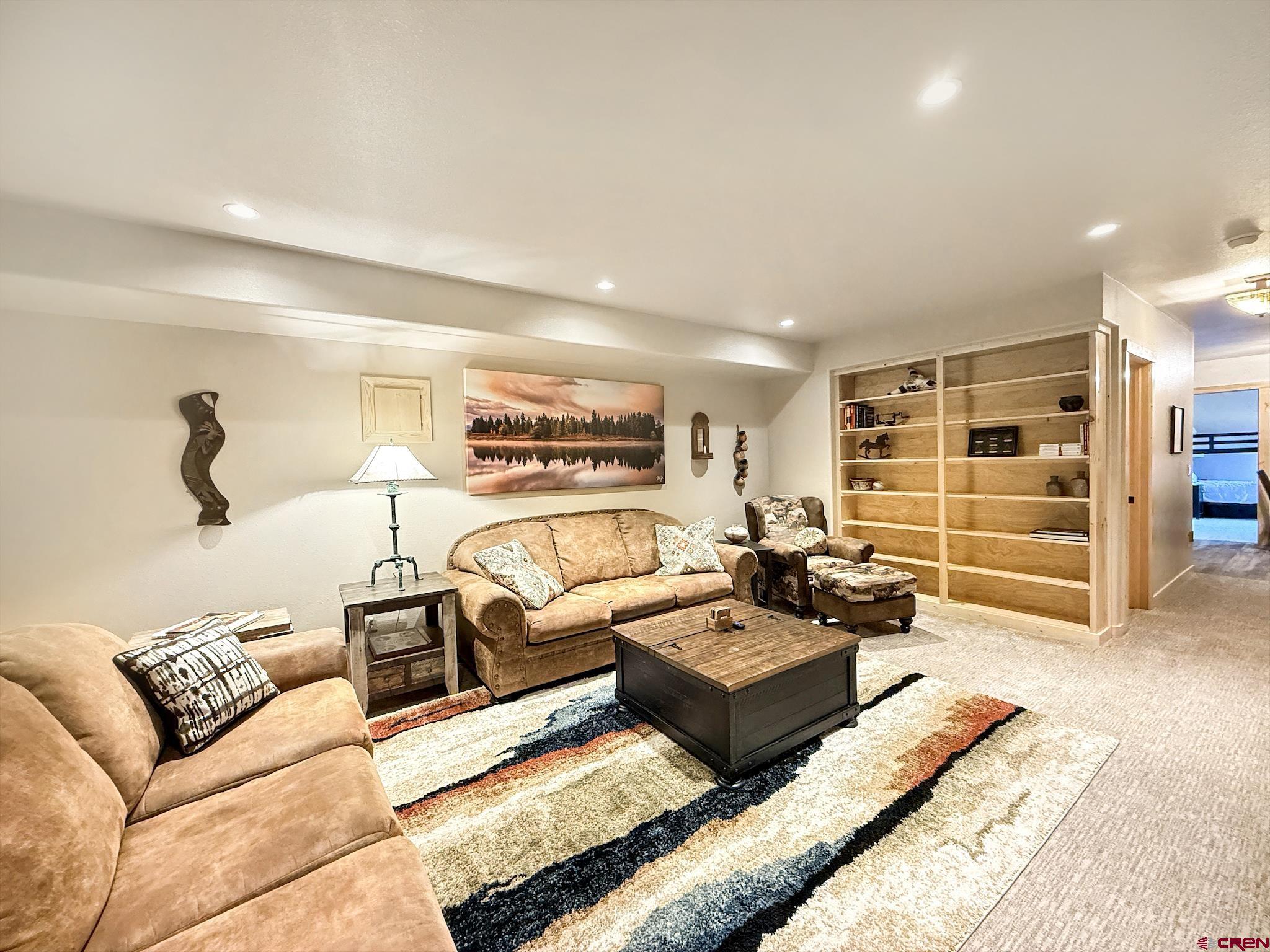 1190 7745 Road Crawford, CO 81415 - Photo 28 of 43 a living room with furniture ceiling fan