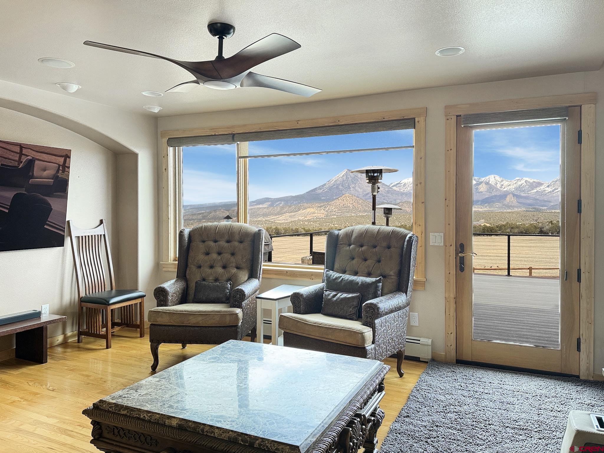 1190 7745 Road Crawford, CO 81415 - Photo 6 of 43 a living room with furniture and a large window