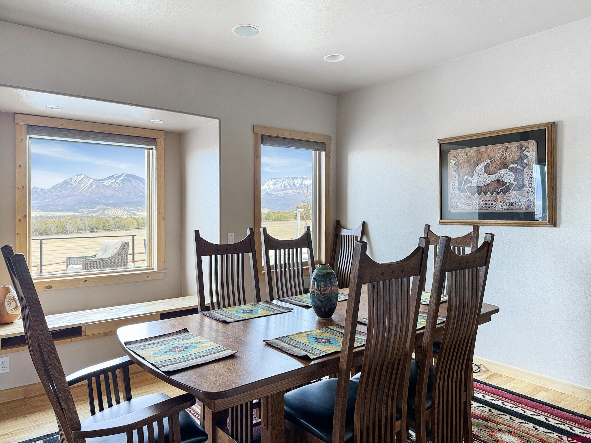 1190 7745 Road Crawford, CO 81415 - Photo 8 of 43 a view of a dining room with furniture a rug and wooden floor