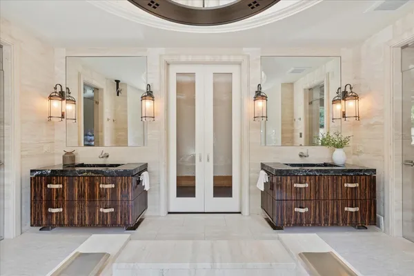 a room with a dresser and a window