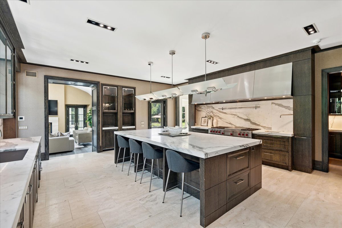 261 East Onwentsia Road Lake Forest, IL 60045 - Photo 30 of 65 a large kitchen with a counter space a sink stainless steel appliances and cabinets