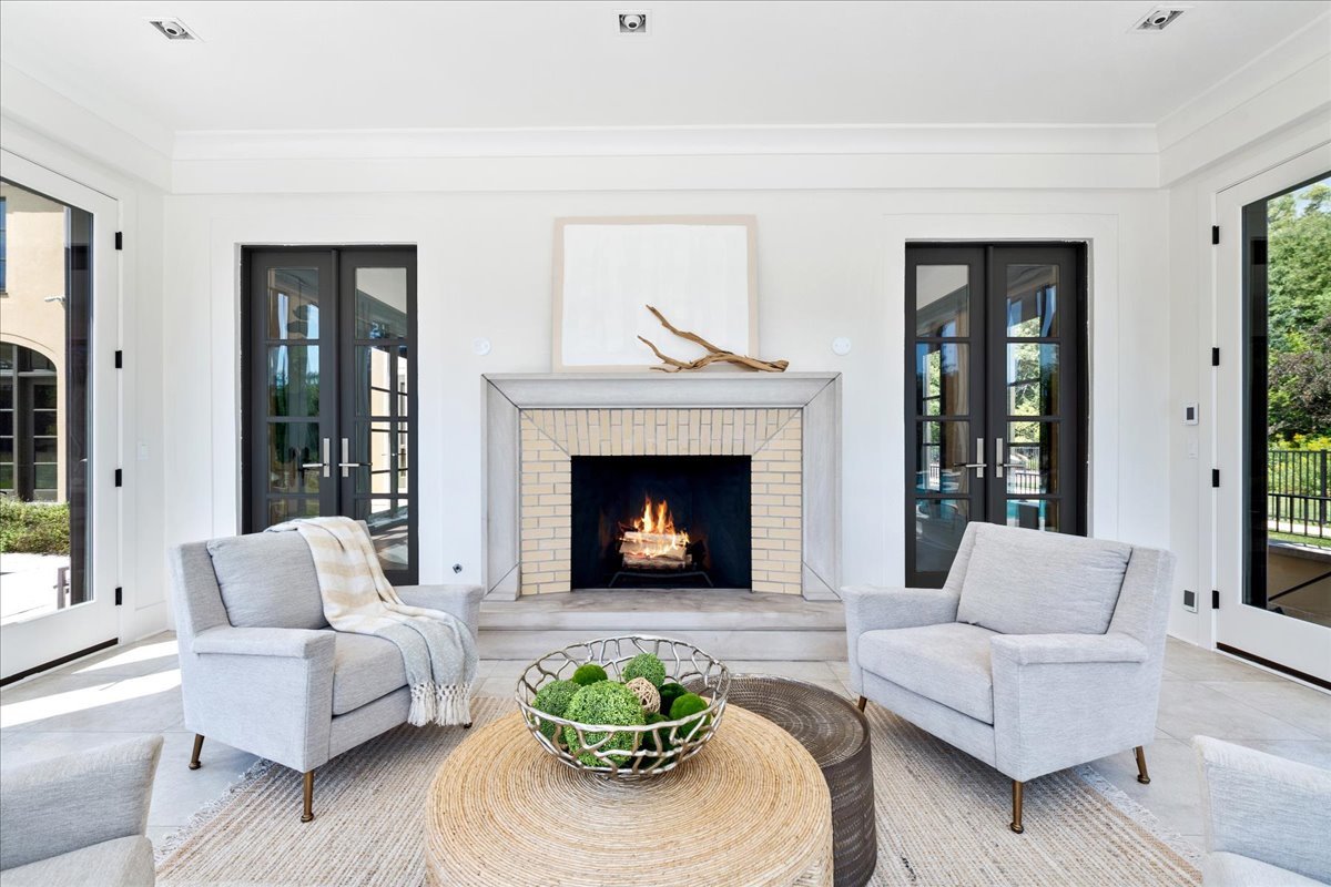 261 East Onwentsia Road Lake Forest, IL 60045 - Photo 38 of 65 a living room with furniture and a fireplace