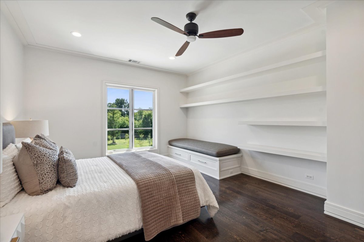 261 East Onwentsia Road Lake Forest, IL 60045 - Photo 48 of 65 a bedroom with a bed and a large window