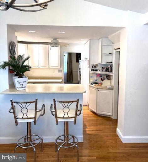 306 East Springfield Road Springfield, PA 19064 - Photo 18 of 40 a kitchen with cabinets and chairs