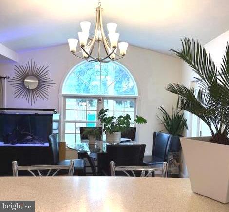 306 East Springfield Road Springfield, PA 19064 - Photo 19 of 40 a view of a living room with a chandelier and living room view