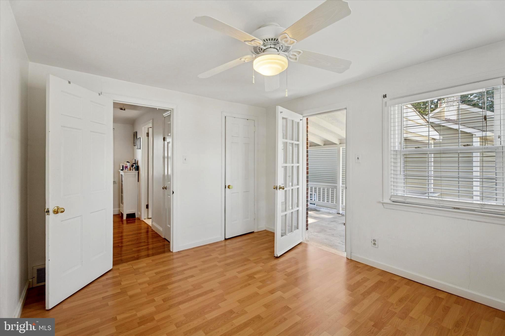 306 East Springfield Road Springfield, PA 19064 - Photo 28 of 40 wooden floor in an empty room with a window