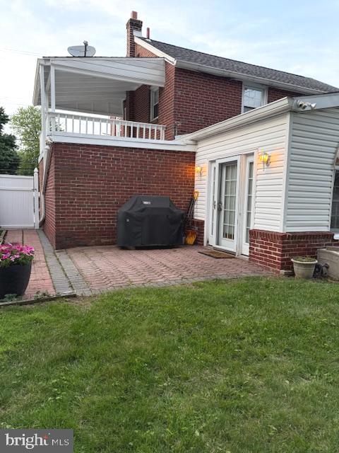 306 East Springfield Road Springfield, PA 19064 - Photo 30 of 40 a front view of a house with a yard and garage