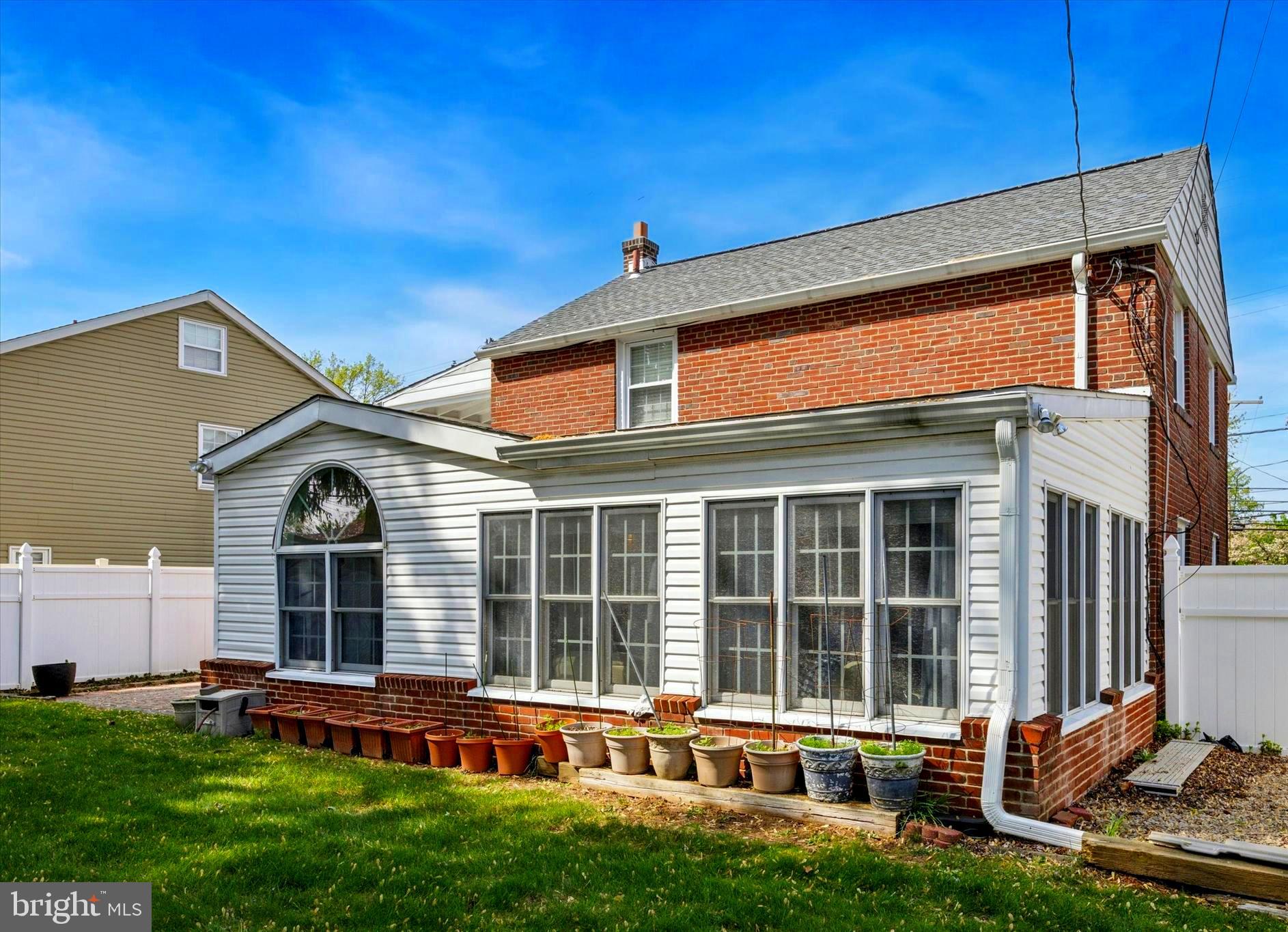 306 East Springfield Road Springfield, PA 19064 - Photo 3 of 40 a front view of a house with a yard