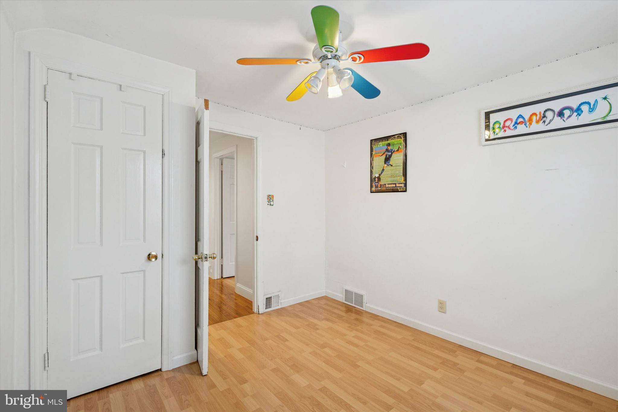 306 East Springfield Road Springfield, PA 19064 - Photo 31 of 40 a view of a bedroom with a bed and a chandelier fan