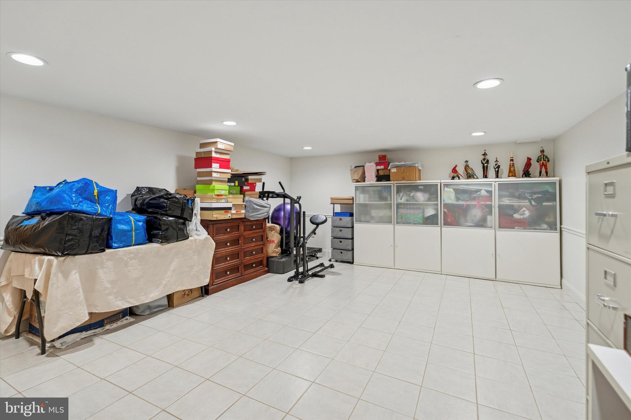 306 East Springfield Road Springfield, PA 19064 - Photo 35 of 40 a room with furniture and white walls