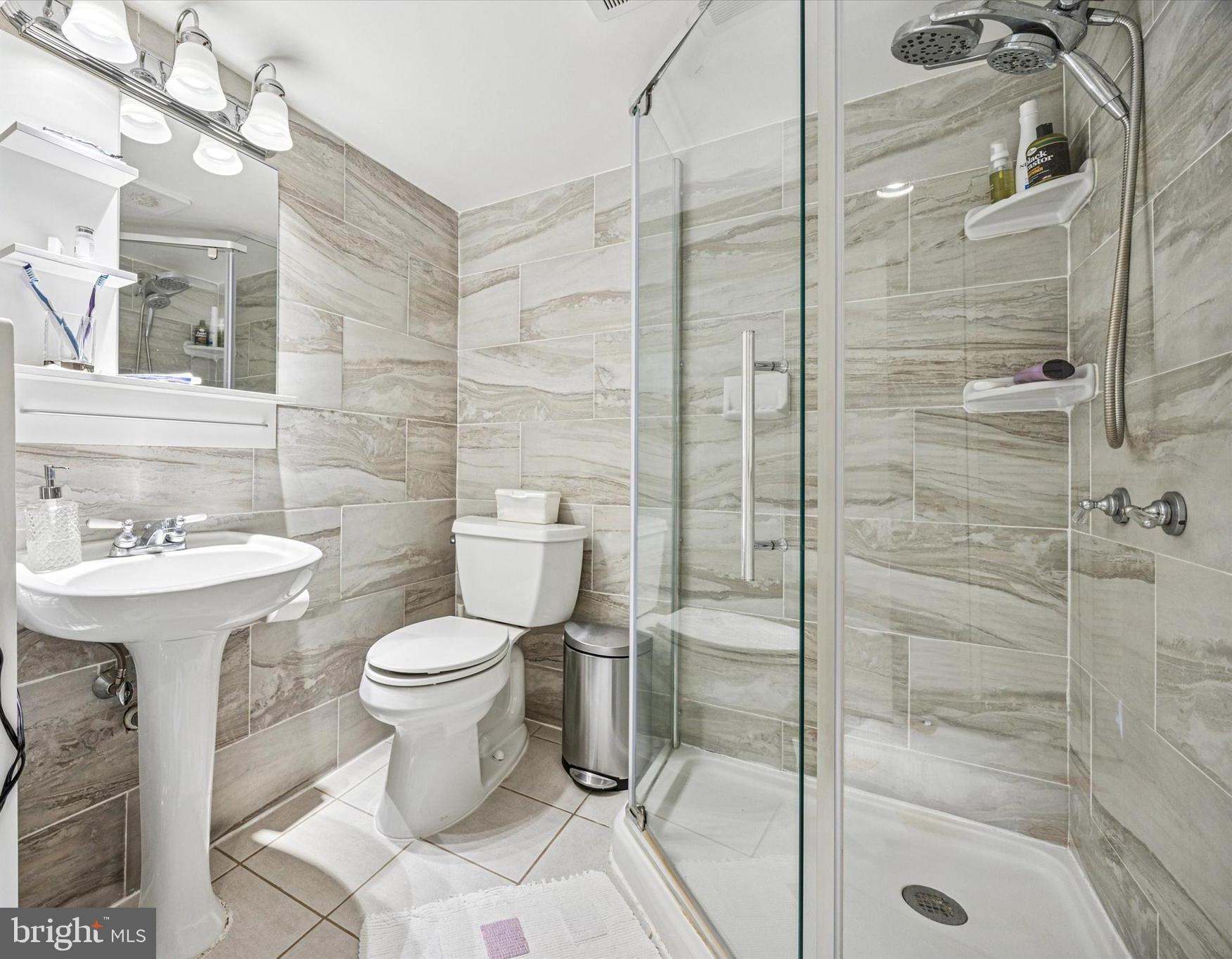 306 East Springfield Road Springfield, PA 19064 - Photo 36 of 40 a bathroom with a sink toilet and shower