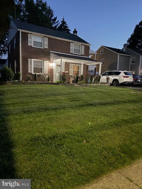 306 East Springfield Road Springfield, PA 19064 - Photo 40 of 40 a front view of house with yard and green space