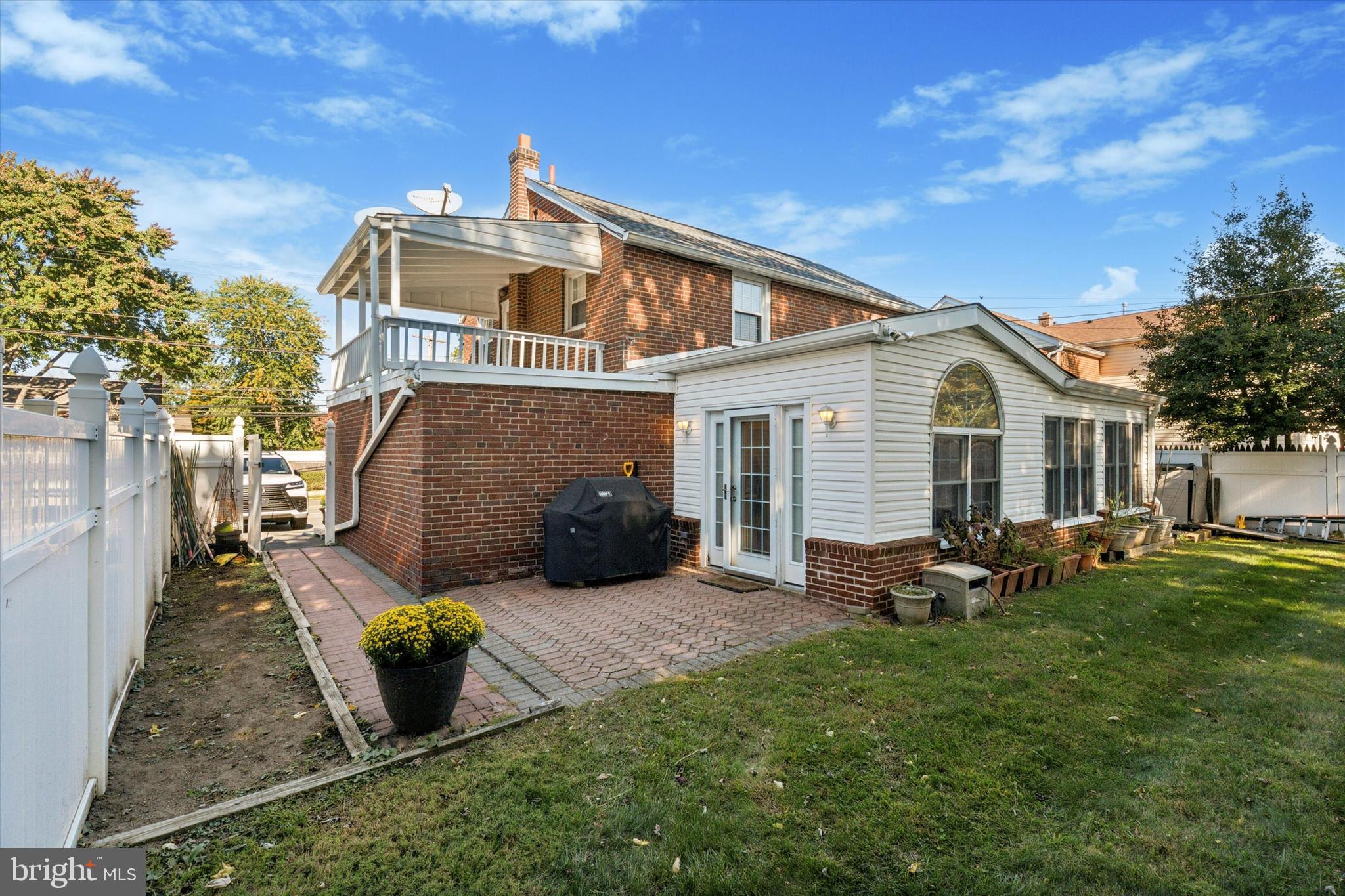 306 East Springfield Road Springfield, PA 19064 - Photo 4 of 40 a view of a house with backyard and sitting area