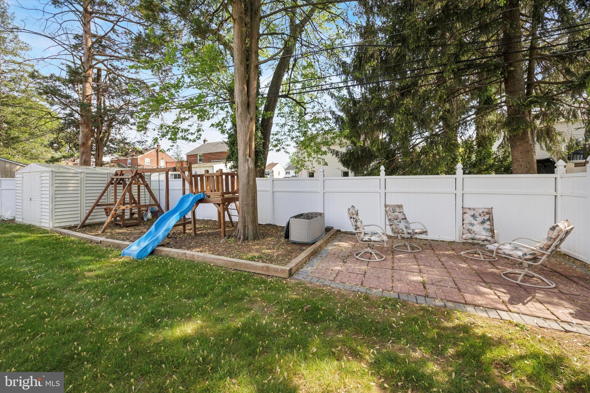 306 East Springfield Road Springfield, PA 19064 - Photo 5 of 40 a view of a backyard with a slide