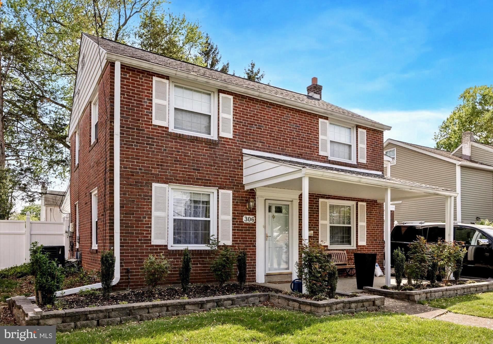 306 East Springfield Road Springfield, PA 19064 - Photo 6 of 40 a front view of a house with swimming pool and glass windows