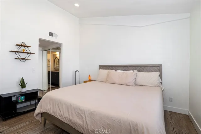 a view of a hallway with walk in closet