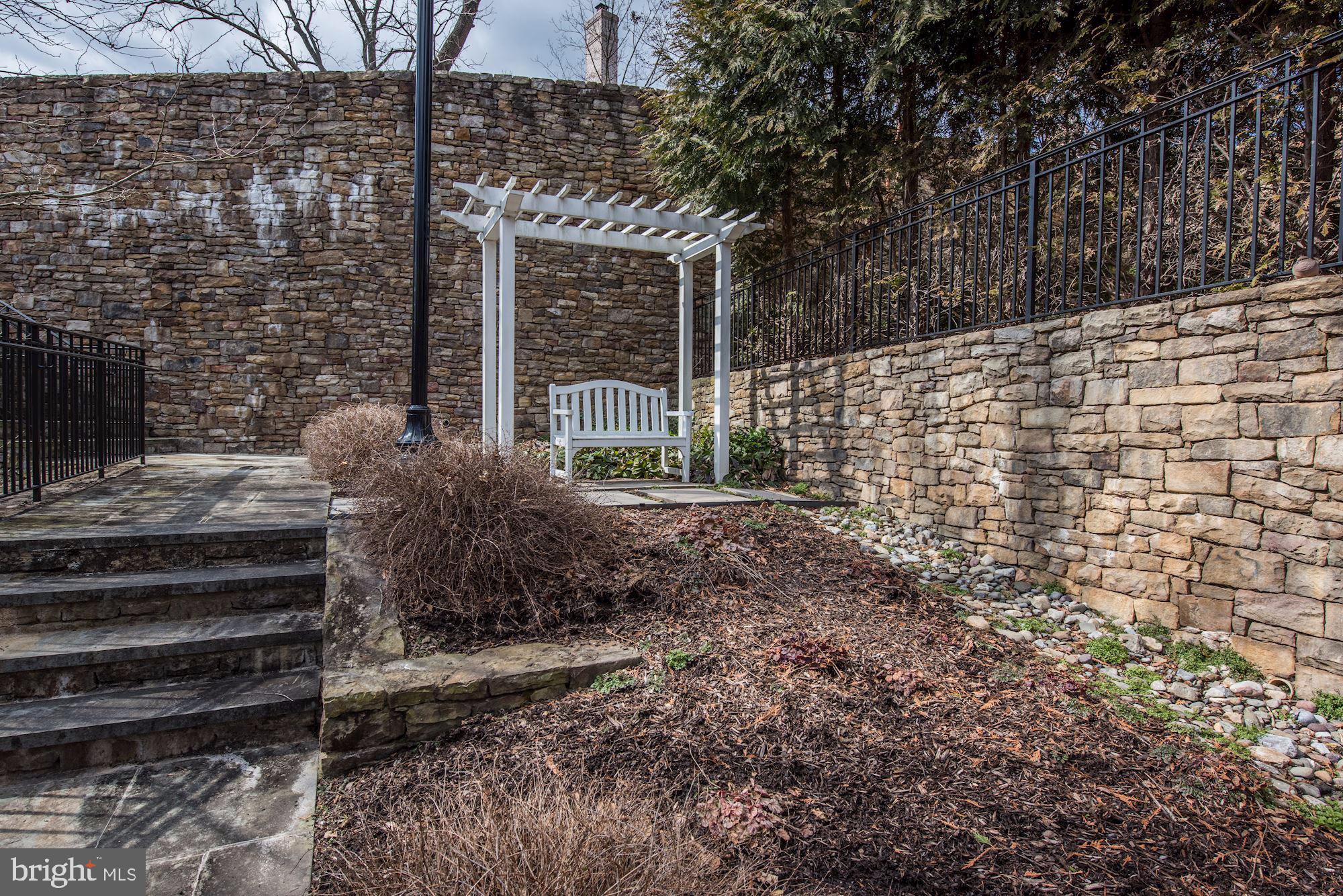 4513 Hoban Road Northwest Washington, DC 20007 - Photo 23 of 29 a view of a house with a yard
