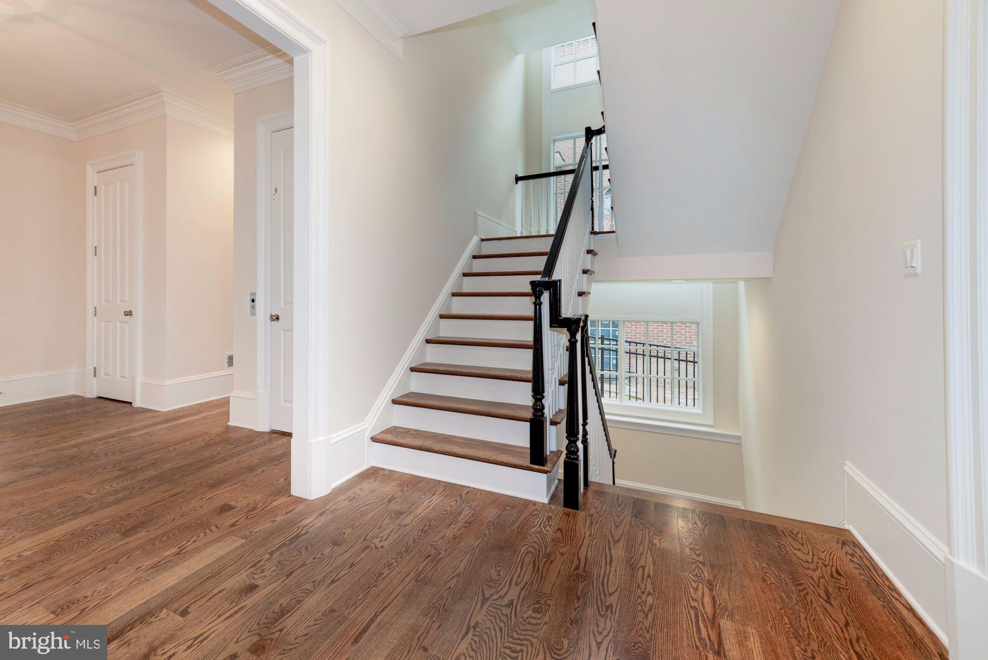4513 Hoban Road Northwest Washington, DC 20007 - Photo 6 of 29 a view of an entryway with wooden floor