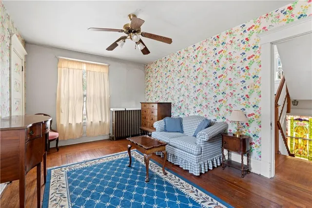 a living room with furniture and a window