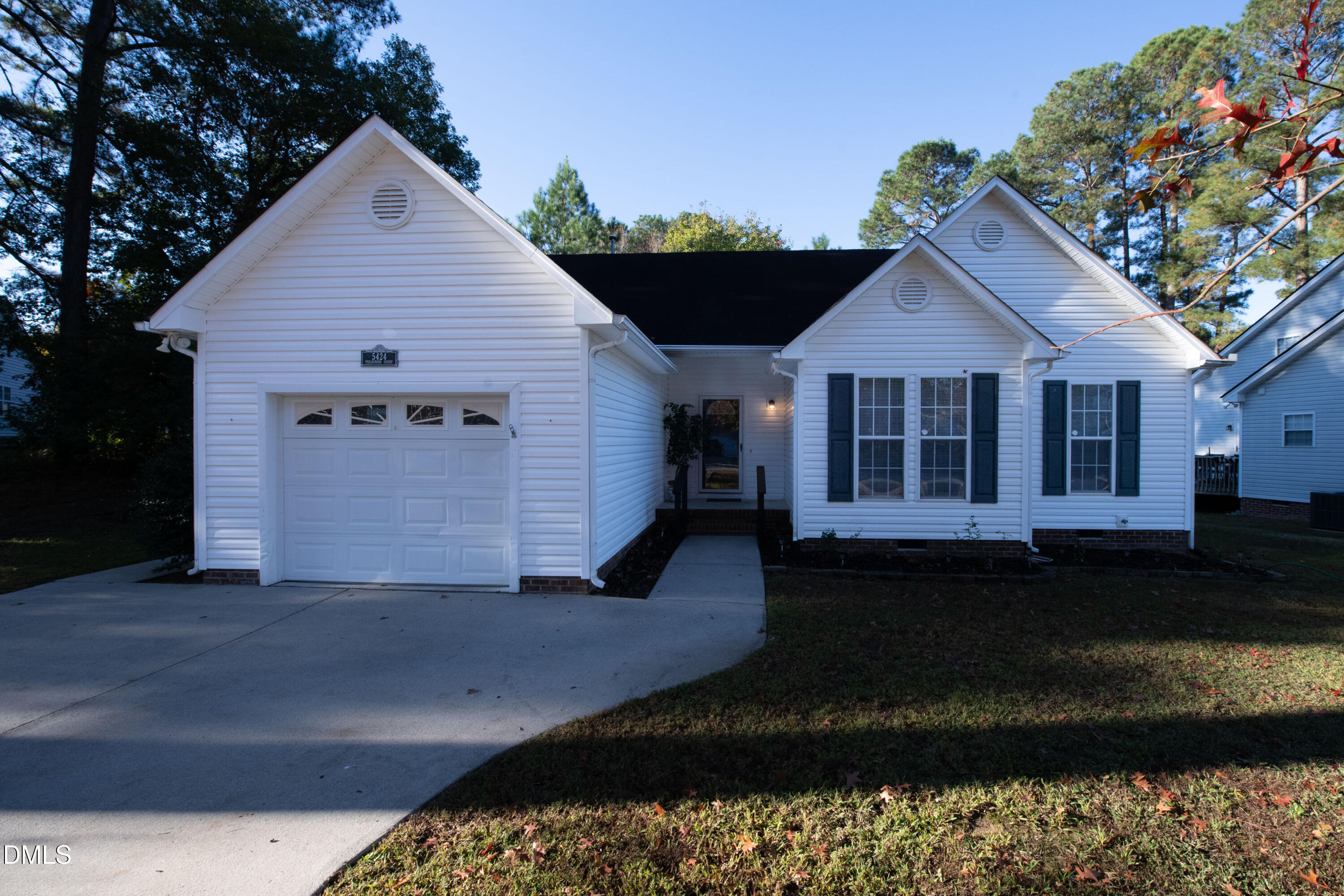 a view of a house with a garden