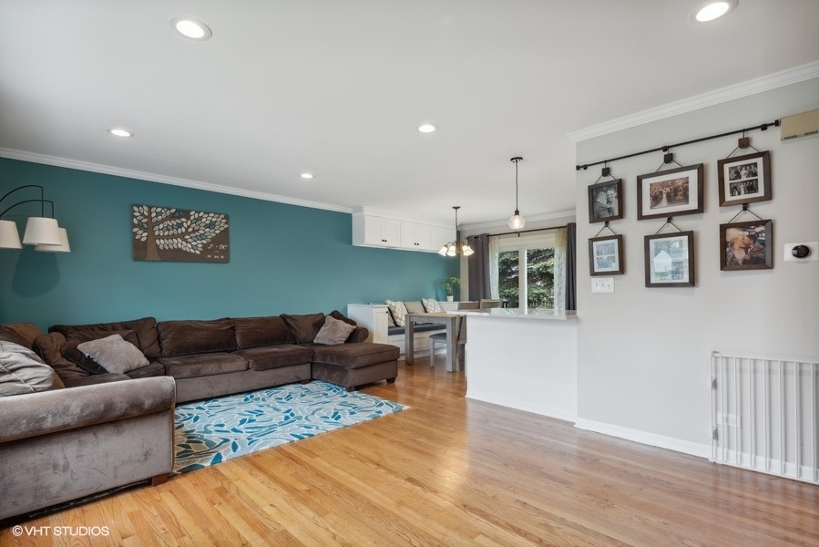 534 71st Street Darien, IL 60561 - Photo 4 of 20 a living room with furniture and wooden floor