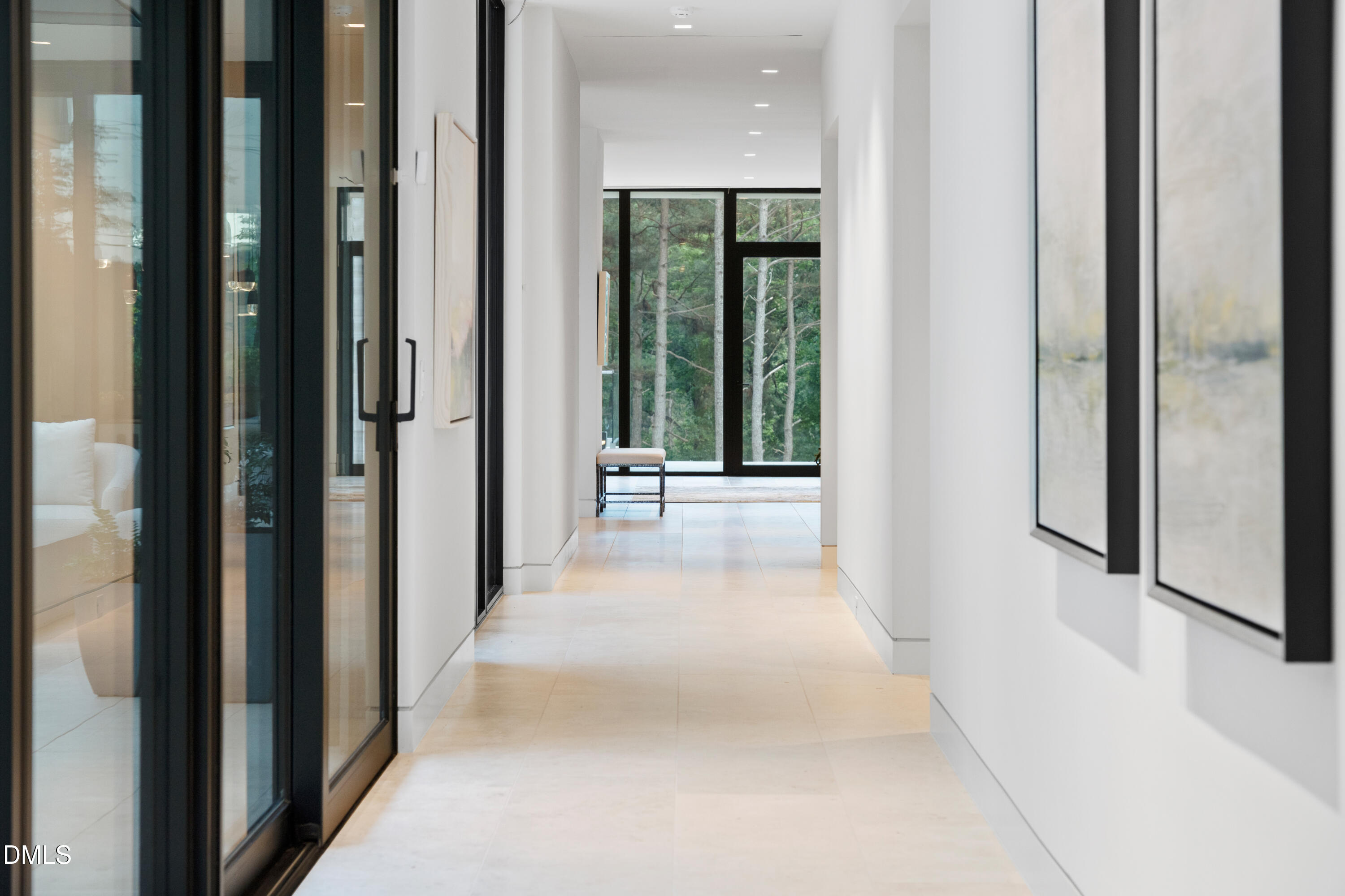 403 Rutherglen Drive Cary, NC 27511 - Photo 13 of 27 a view of a hallway with wooden floor and windows