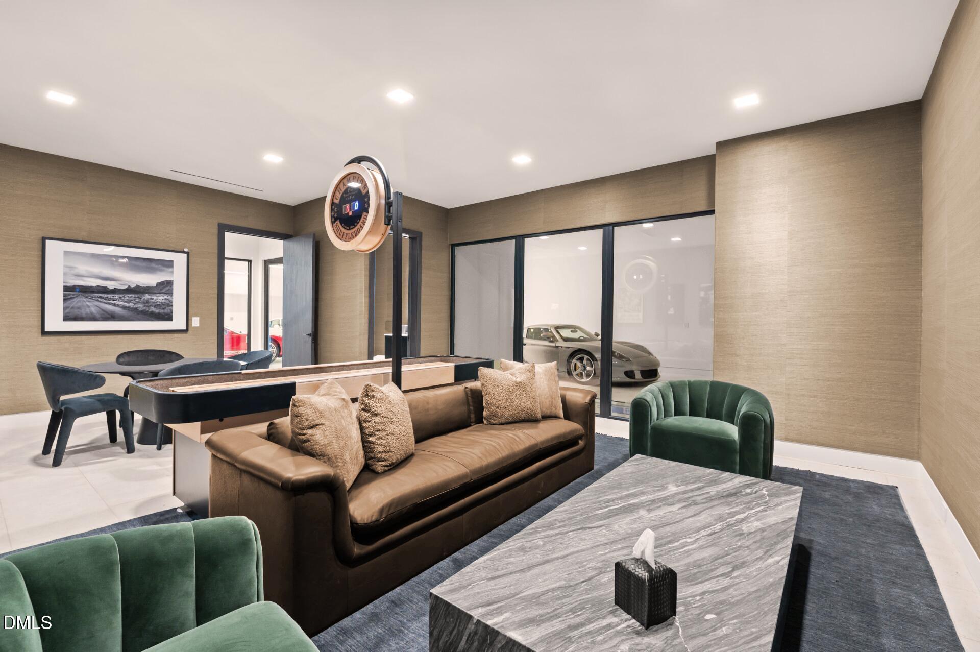 403 Rutherglen Drive Cary, NC 27511 - Photo 20 of 27 a living room with furniture and a large window