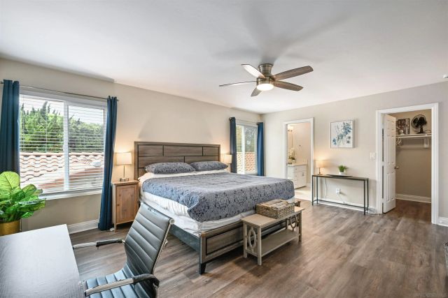 a bed room with a bed and a table