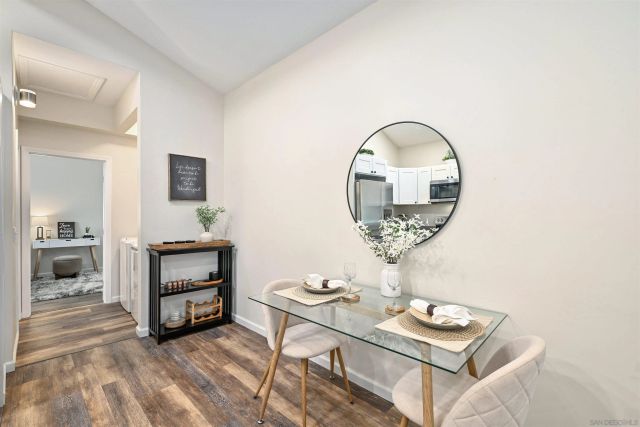 a room with furniture and a mirror