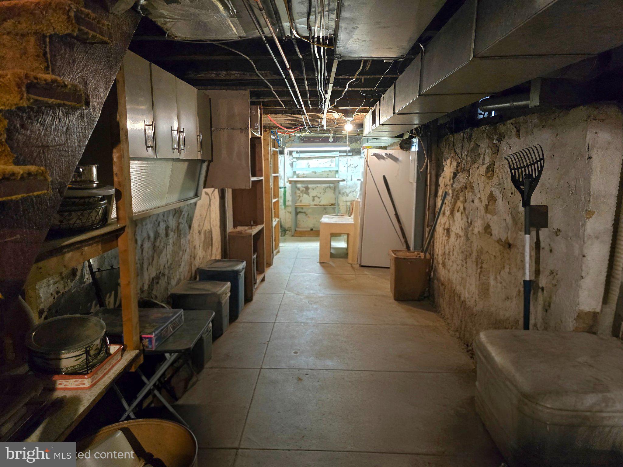 424 West Windsor Street Reading, PA 19601 - Photo 24 of 27 Spacious basement with potential charm.