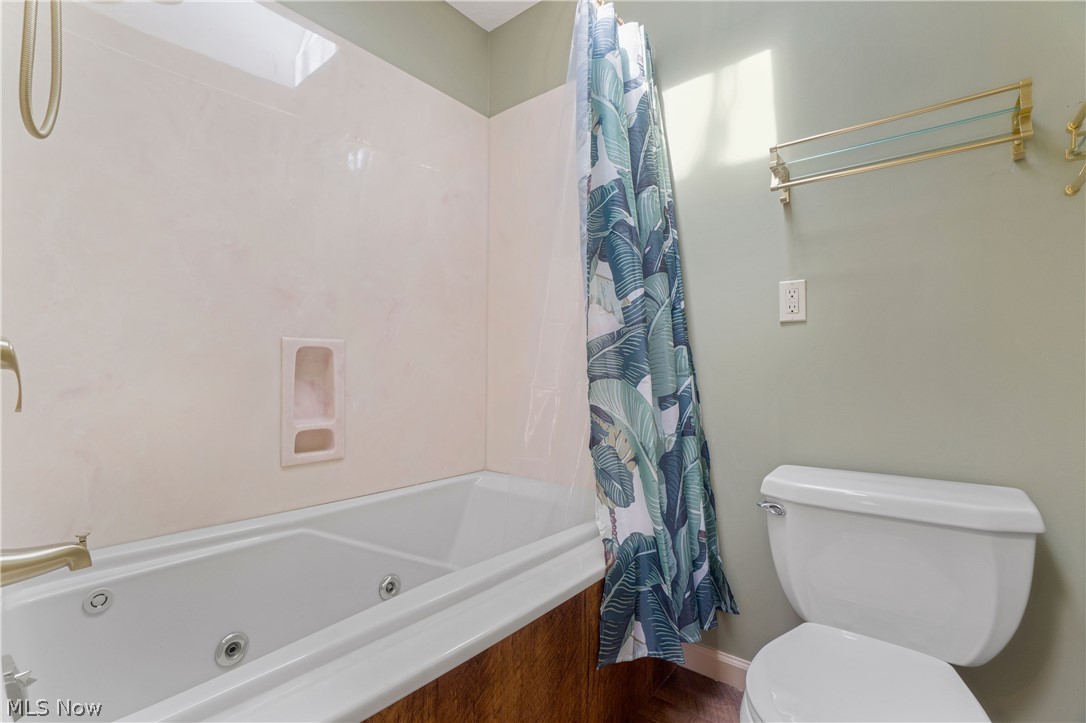 29329 Eddy Road Wickliffe, OH 44092 - Photo 29 of 50 Jack and Jill Bathroom with toilet and shower / whirlpool tub combination