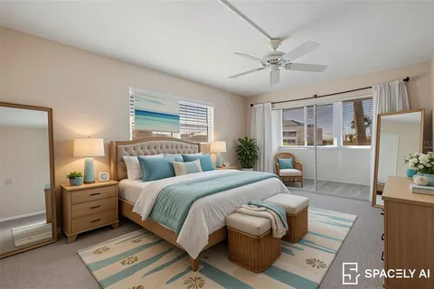 a bedroom with a large bed and a window