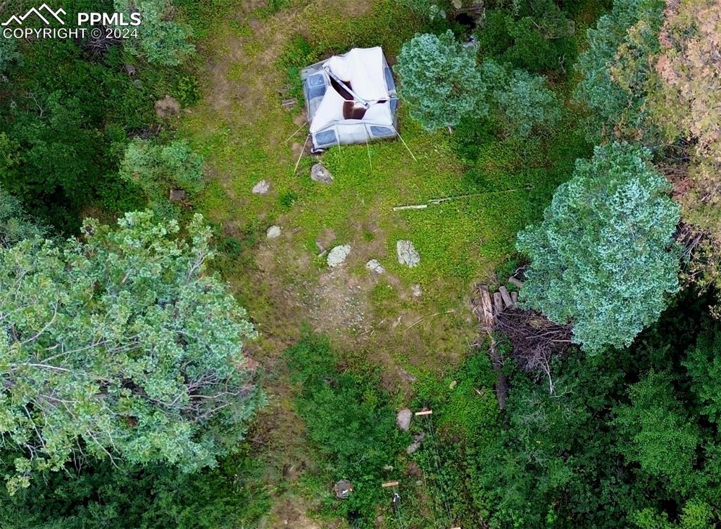 Ute Road Cascade, CO 80809 - Photo 2 of 12 a aerial view of a house