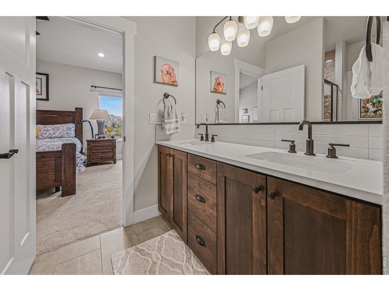 6309 2nd Street Greeley, CO 80634 - Photo 13 of 33 a kitchen with a sink cabinets and refrigerator