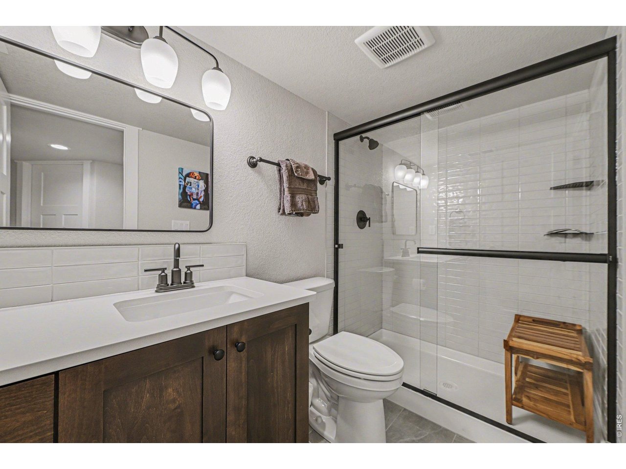 6309 2nd Street Greeley, CO 80634 - Photo 24 of 33 a bathroom with a sink a toilet and shower